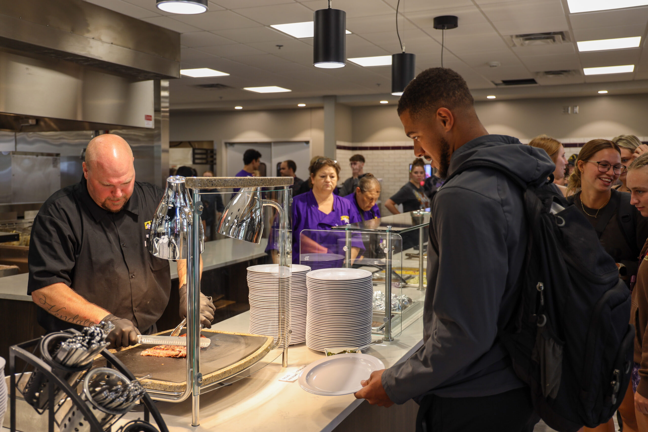 Meat being carved at new dining hall