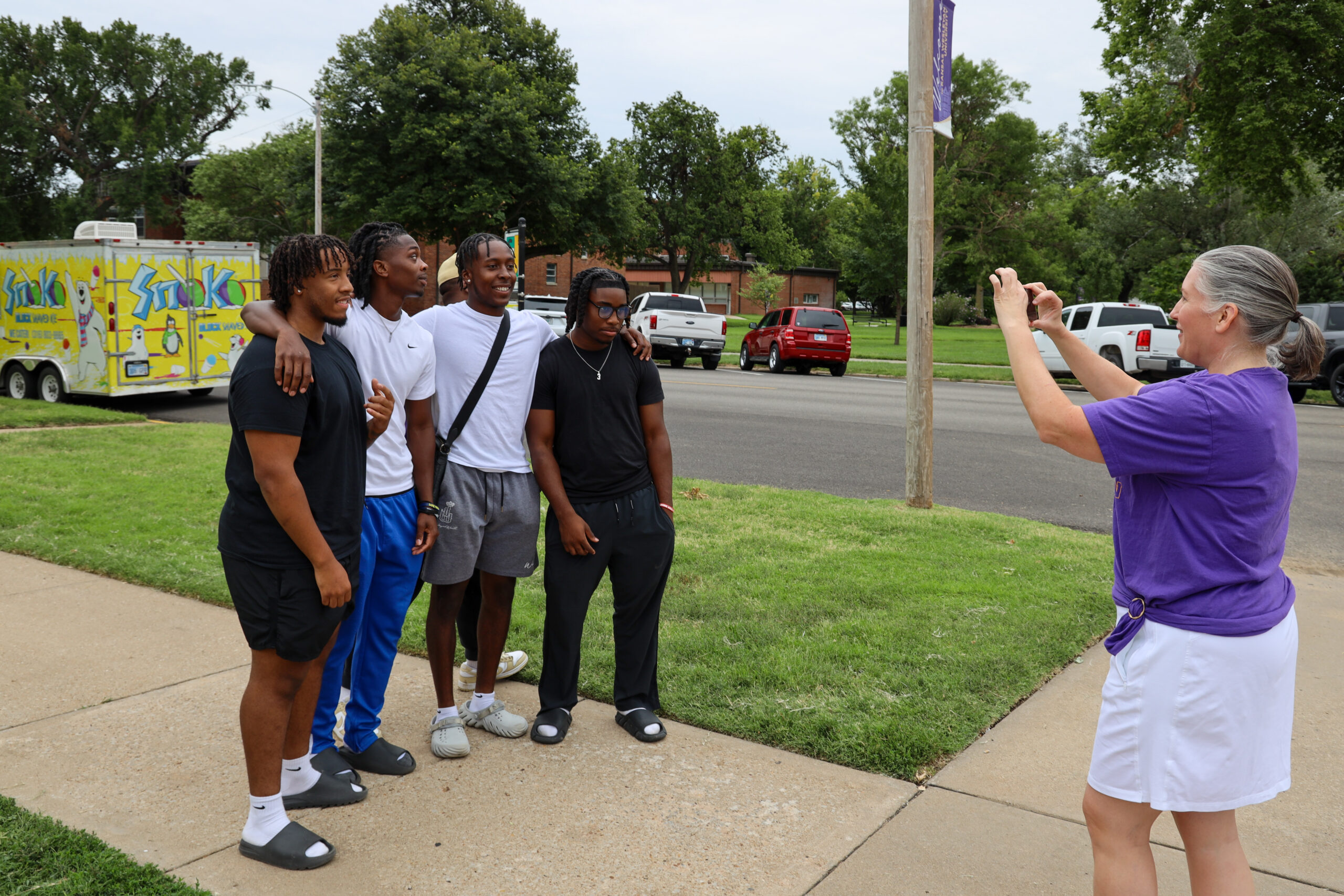 Group of individuals getting picture taken