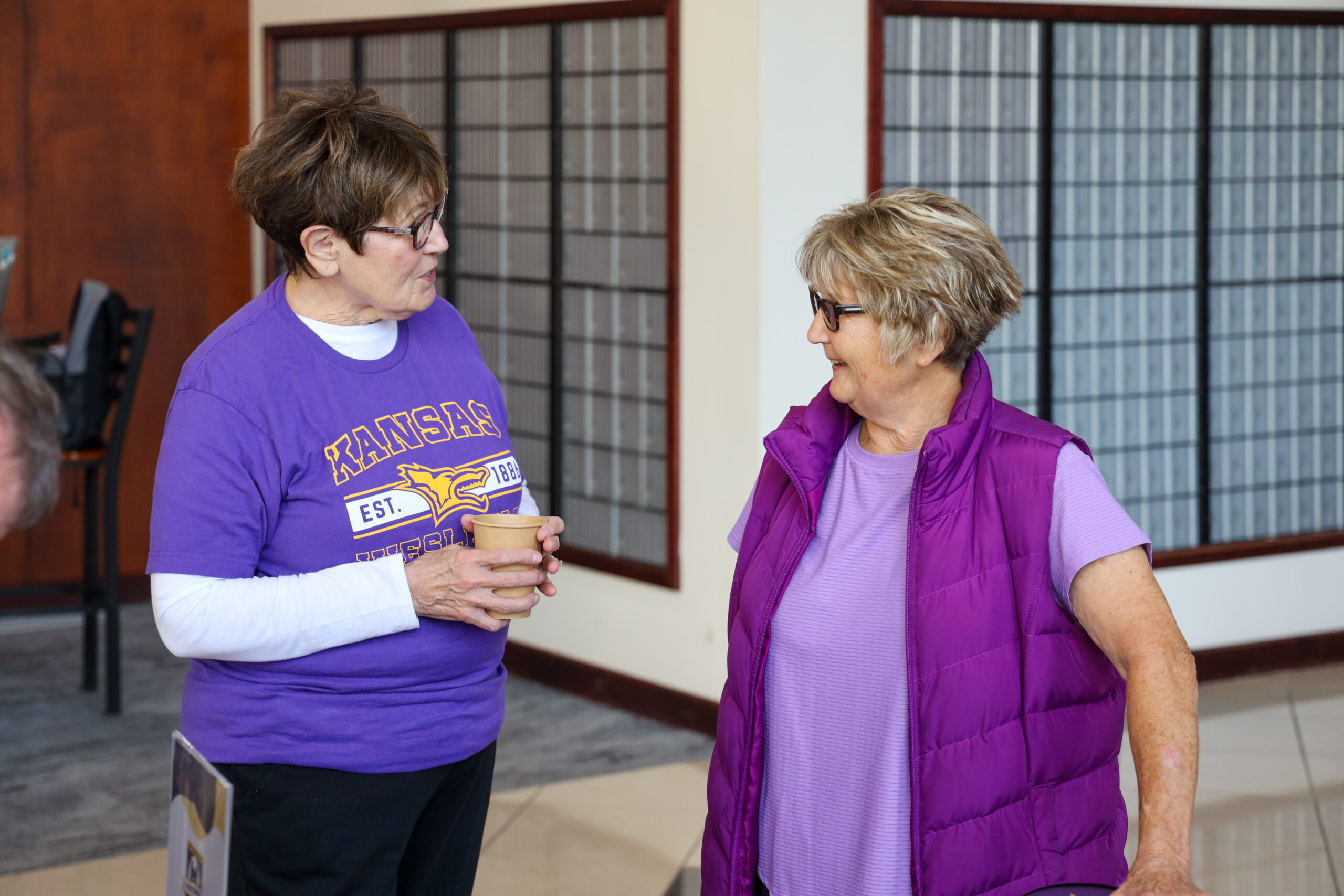 Two women talking in SAC