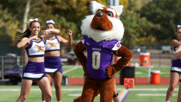 Casey with cheerleaders