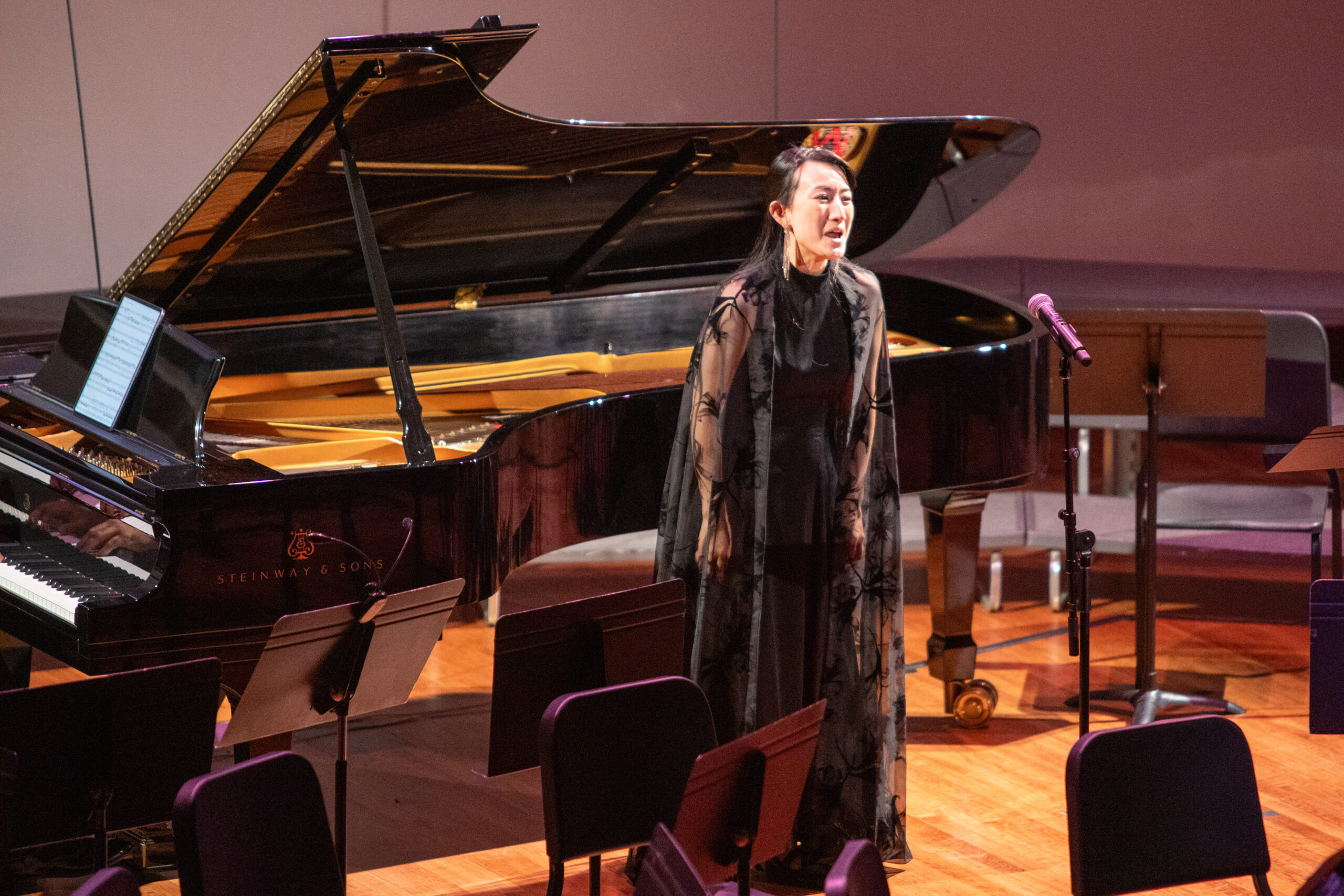 Woman singing on stage