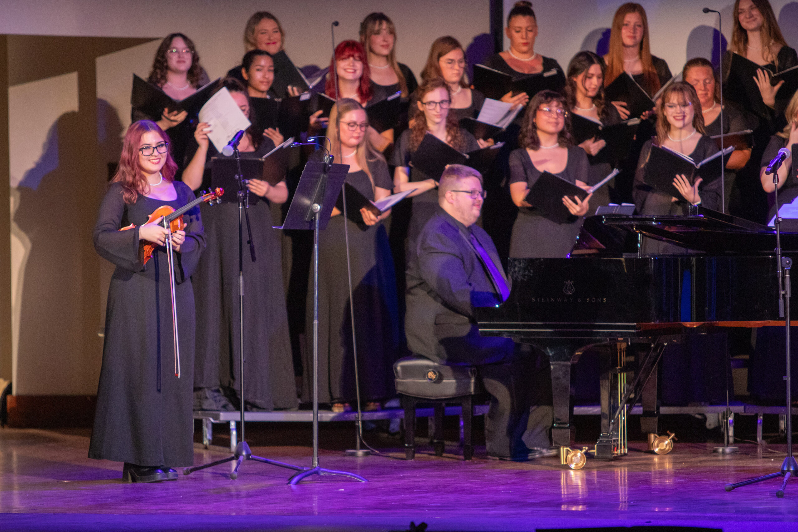 Piano player and choir singing