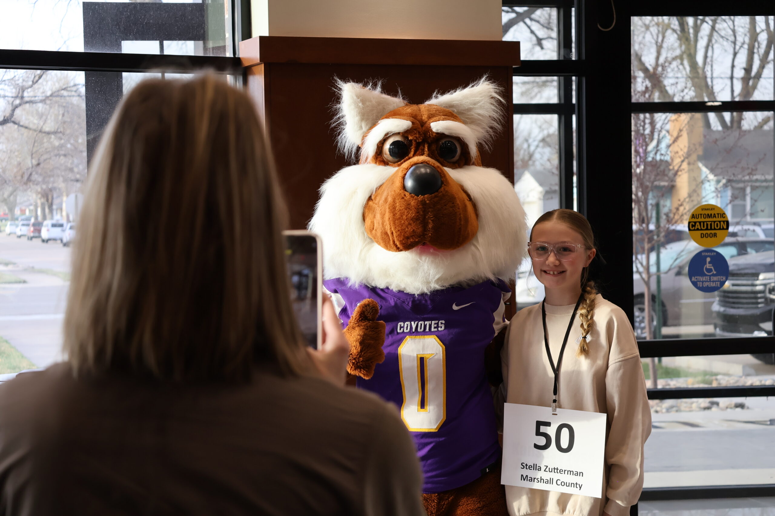 Female child with mascot