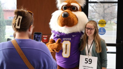 Female child with mascot