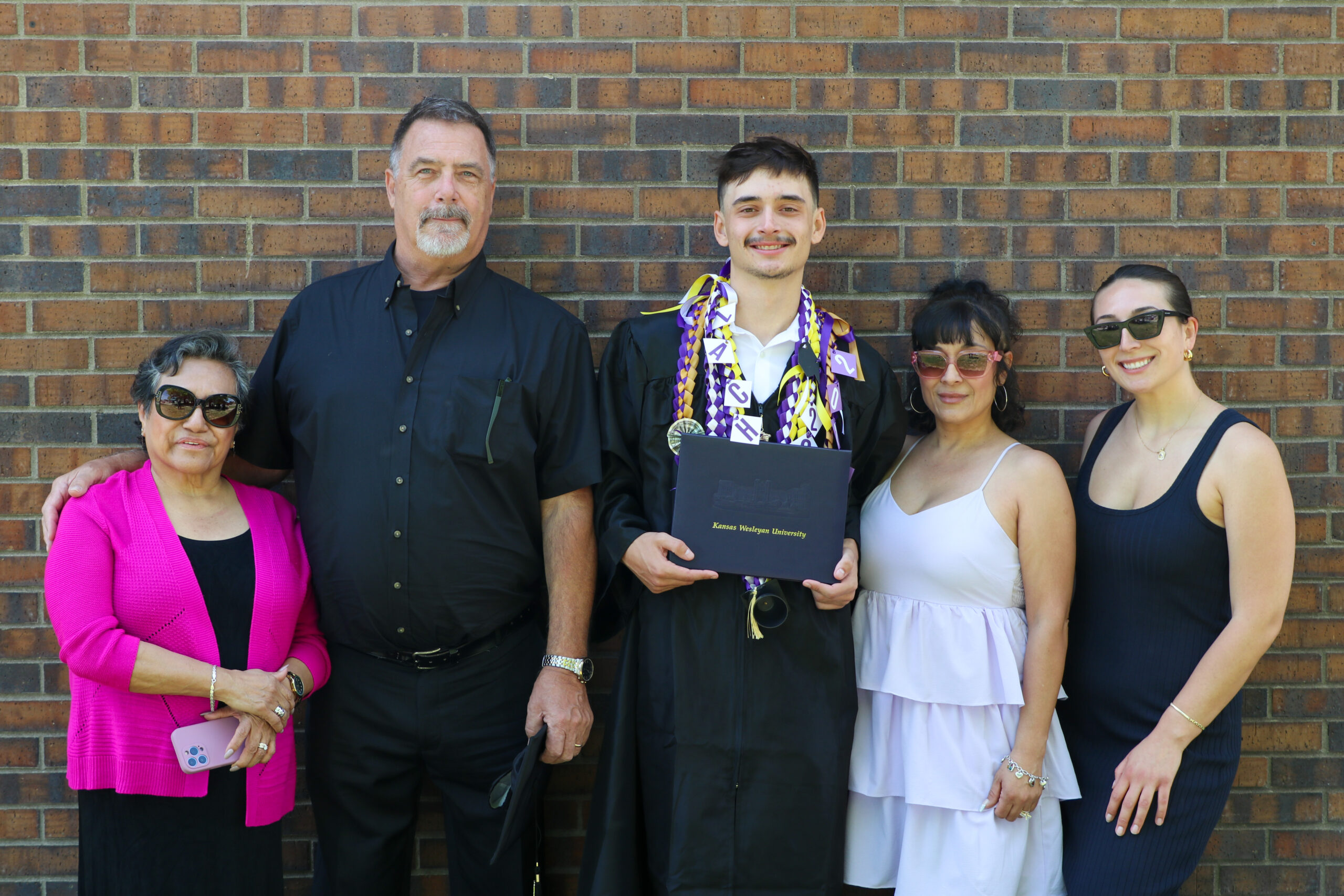 Family with graduating man