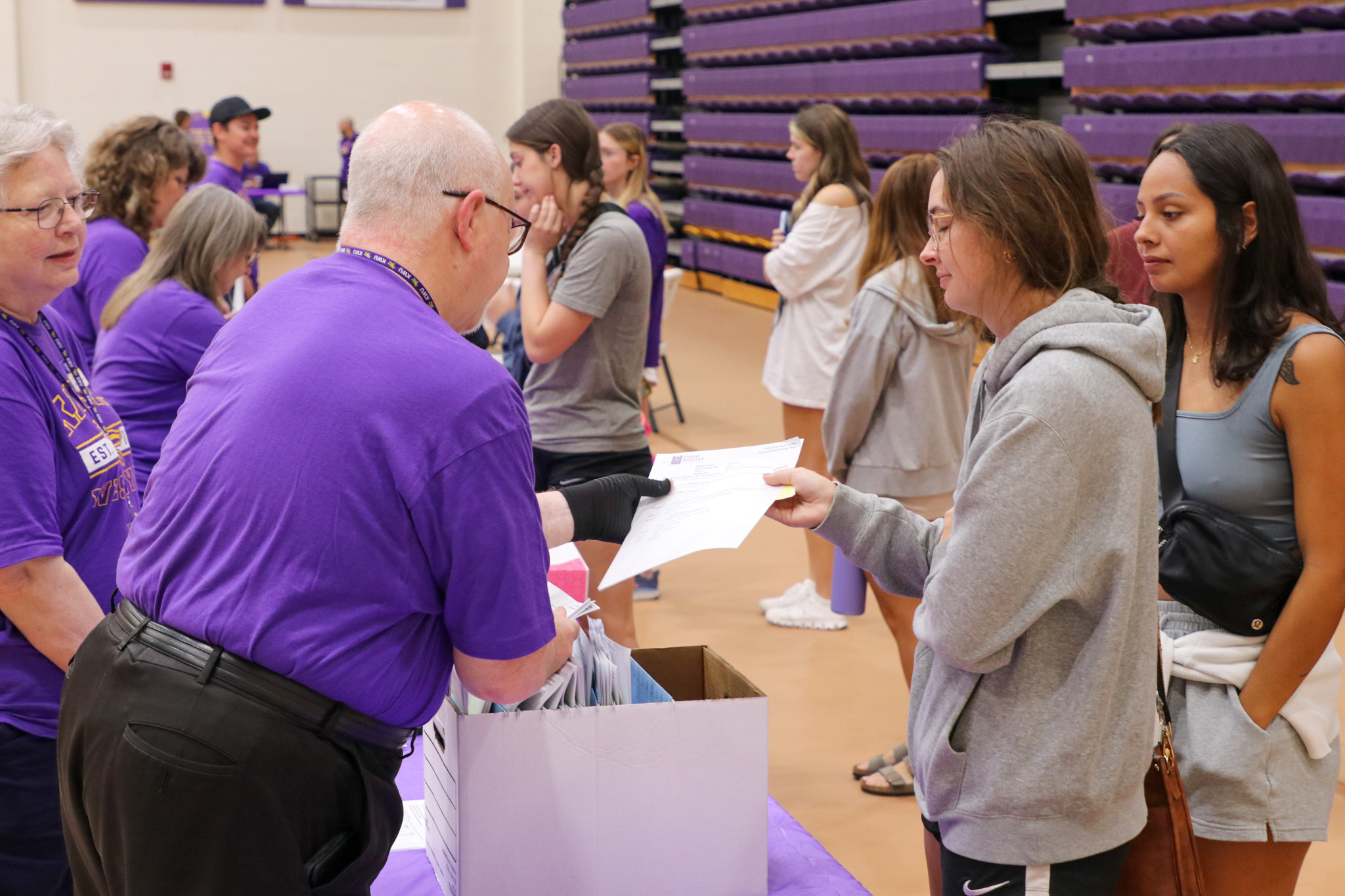 Man helping students at move-in day