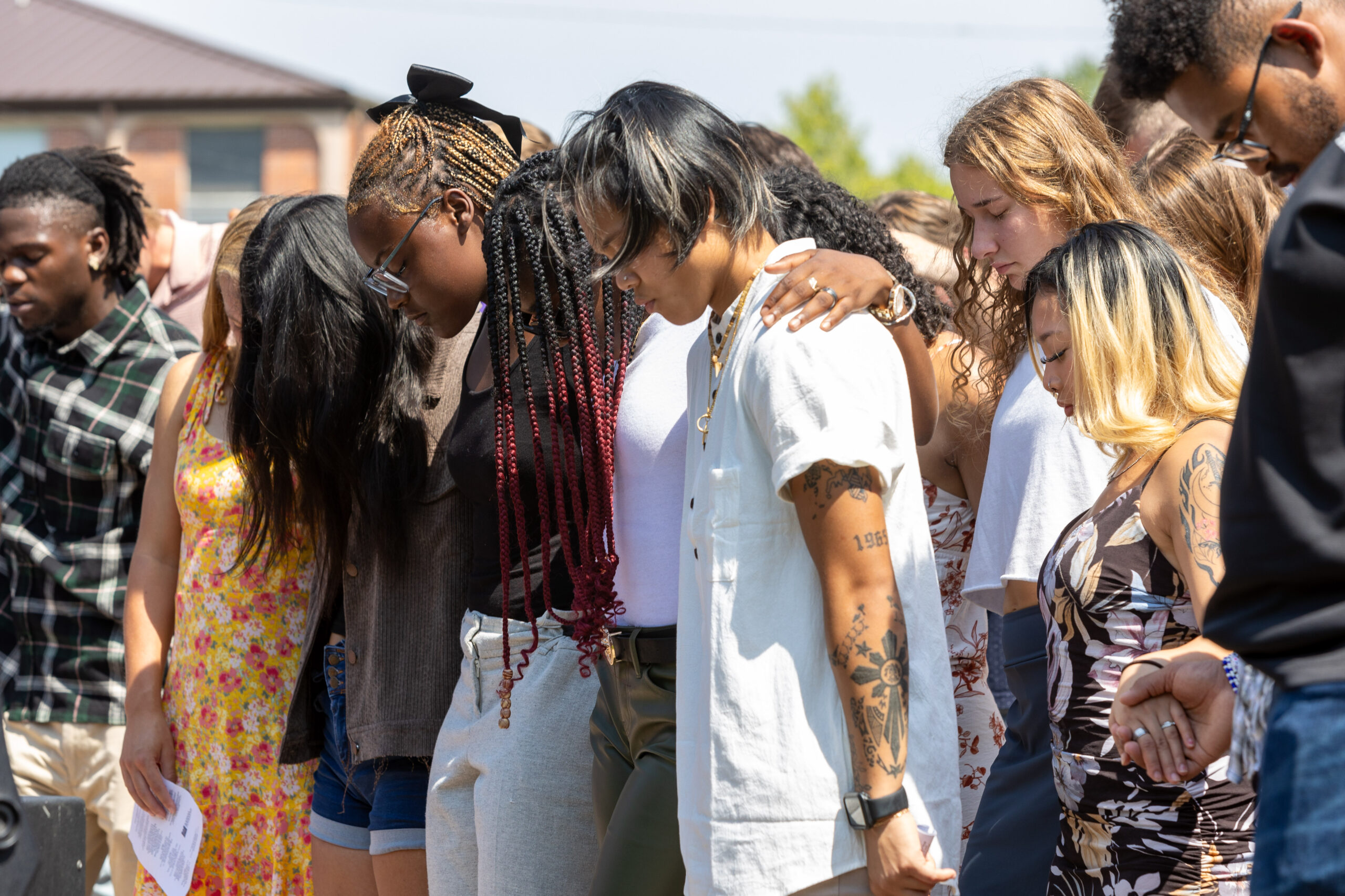 People praying at church service