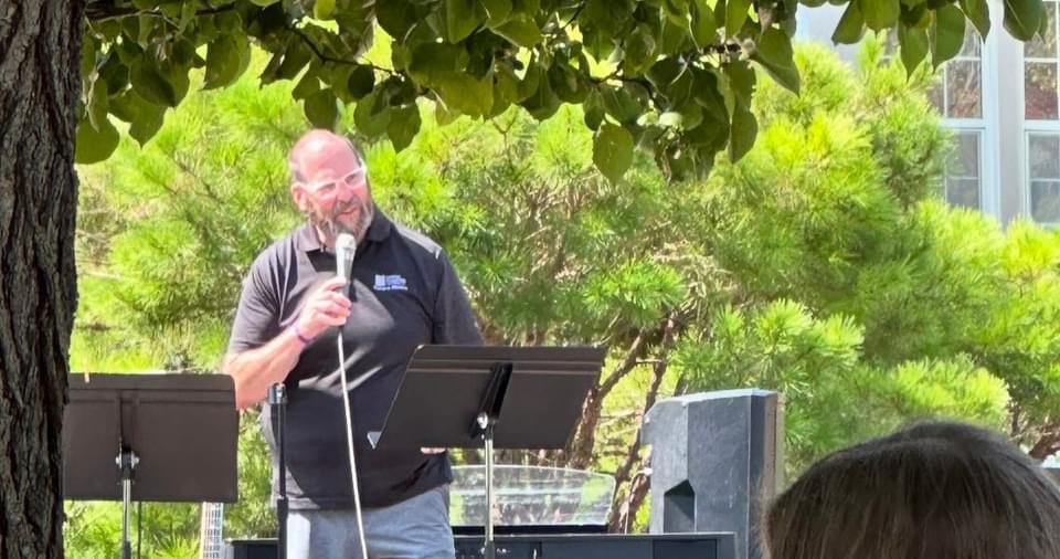 Campus pastor speaking at event