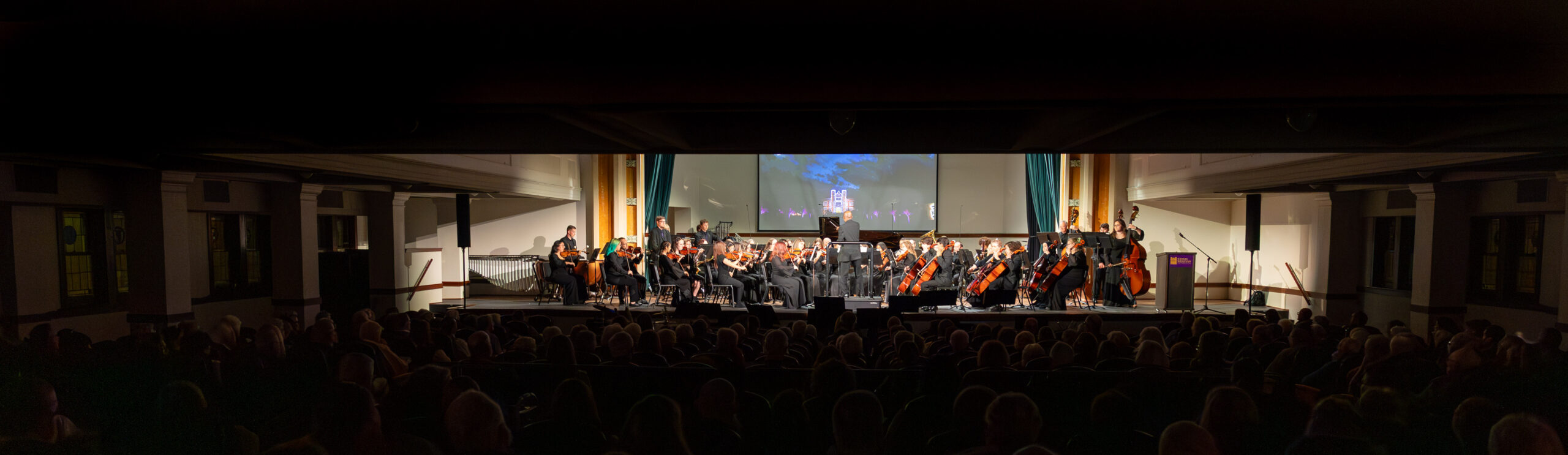 Wide angle shot of Sams Chapel stage and performers during a concert